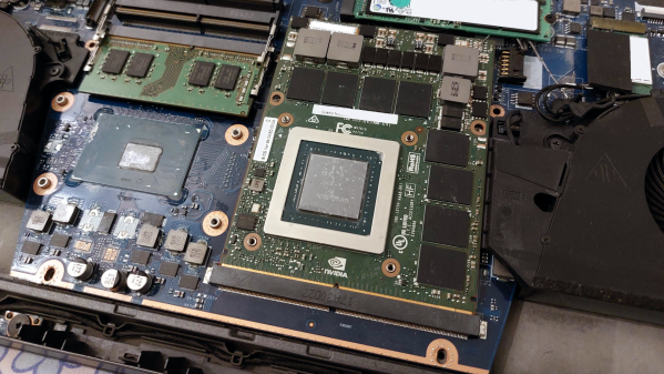A standard-compliant MXM card installed into a laptop, without heatsink