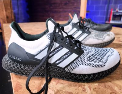 Adidas Ultra 4D running shoes with 3D printed midsole.