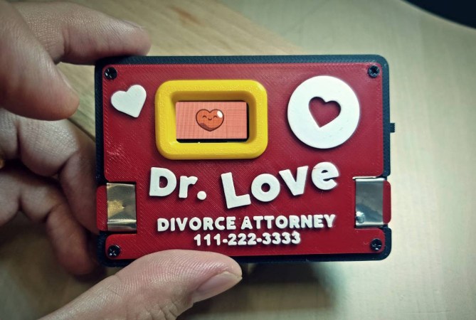 A business card-sized love detector in a 3D-printed package.