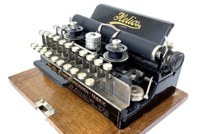 The Helios typewriter, which only has two rows of keys and uses a bunch of layers to expand their input.