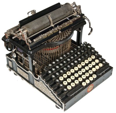 The Smith Premier 1 typewriter. It has separate keys for capital and lower case letters.