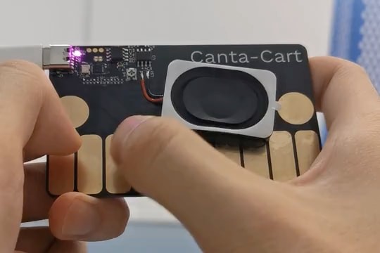 A business card-sized synthesizer with capacitive touch pads.