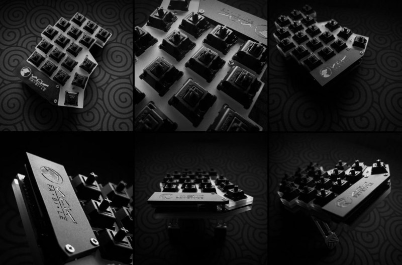Six black and white shots of a Fifi keyboard without her keycaps on.