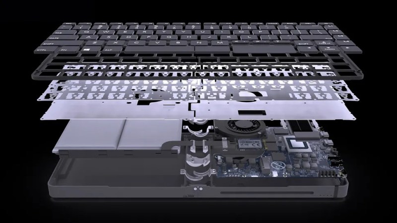 Exploded view of a mini PC built into a keyboard.