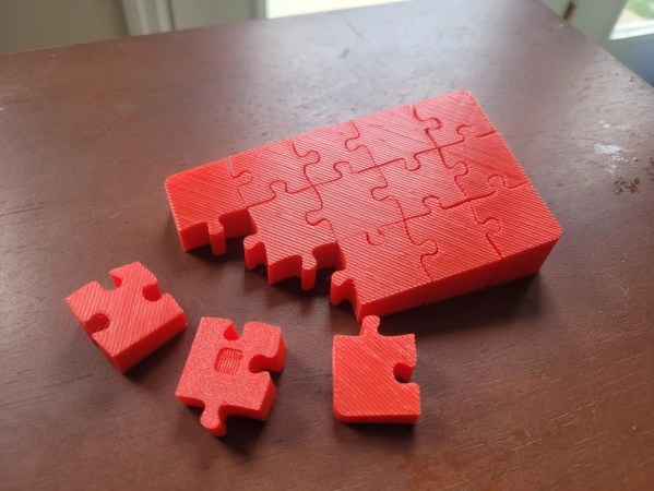 A 3D-printed puzzle for the visually impaired. The pieces have both a texture and a slant.
