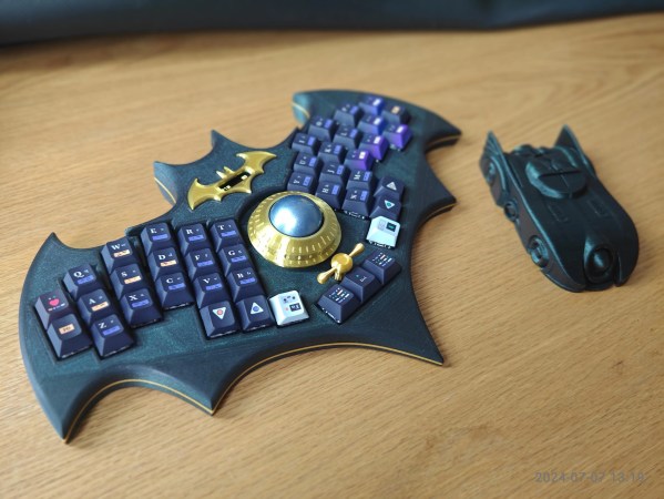 A batarang-shaped keyboard with a Batmobile that we wish was a mouse.