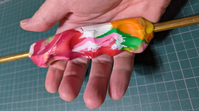 Mixed Clay Used To Form A Custom Ergonomic Hand Grip. | Hackaday