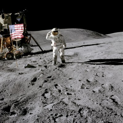 Lunar Module pilot Charles Duke saluting the US flag during Apollo 16. (Credit: NASA)