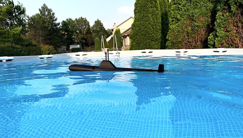 RC submarine surfaced in a pool