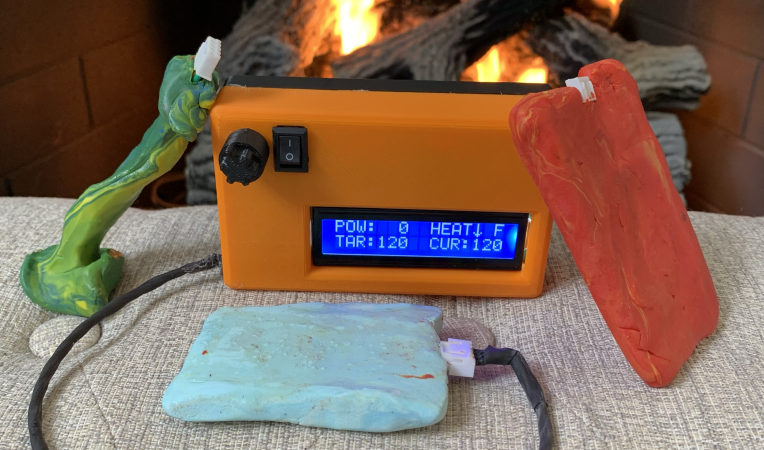 Two types of polymer clay hand warmers with a digital temperature controller.