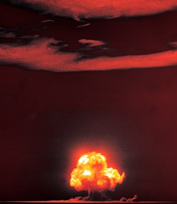 Color-exposed photograph of the Trinity nuclear test. 