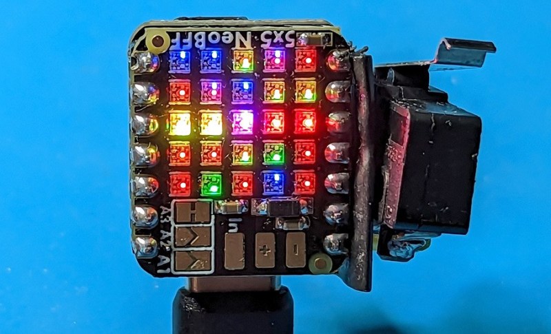 A tiny colorful slot machine that uses LEDs instead of fruits or numbers.