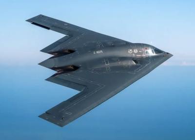 A B-2 Spirit from Whiteman Air Force Base, Mo., flies over an undisclosed location in the U.S. Pacific Command area of operations. (Credit: Senior Airman Joel Pfiester)