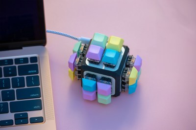 A cube keyboard with adorably vibrant pastel keycaps. 