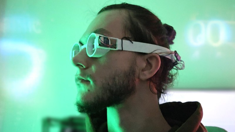 [miko_tarik] wearing diy AR goggles in futuristic setting