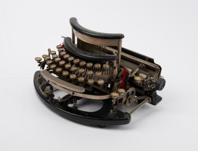 The Imperial Model B typewriter with curved keyboard.