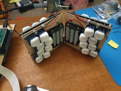 A prototype of a keyboard with wonderful marshmallow-y keys on both the front and the back.