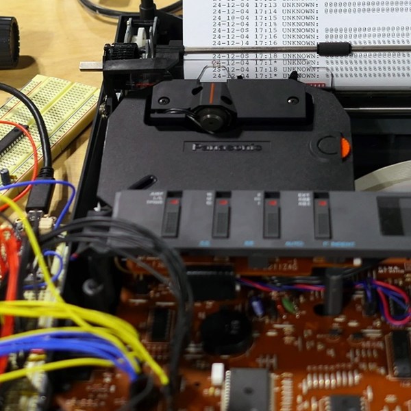 Back To The Future Of Texting: SMS On A Panasonic Typewriter | Hackaday