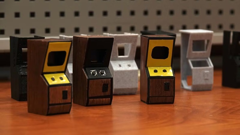 Tiny arcade machines on a tabletop