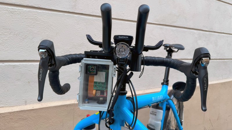 Front view of blue bicycle with Raspberry Pi webserver