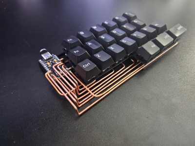 The left half of Banana Katana, a circuit sculpture keyboard.