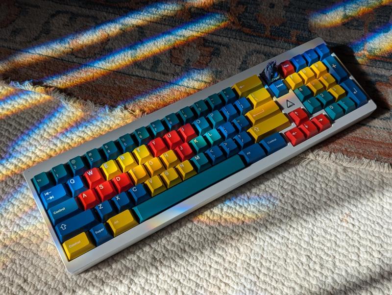 A lovely KBDFans TET with GMK Panels keycaps and some rainbows from nature.