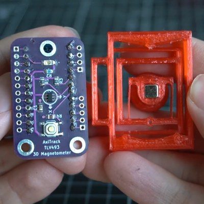 The PCB and flexure bit of Trinteract, a small space mouse.