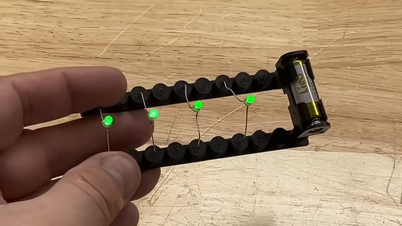 Bar of conductive filament with leds and a battery