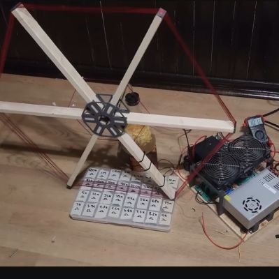 Proof-of-concept of the inductive coupling transmitter with the 12V version of the circuitry (Credit: Hyperspace Pirate, YouTube)