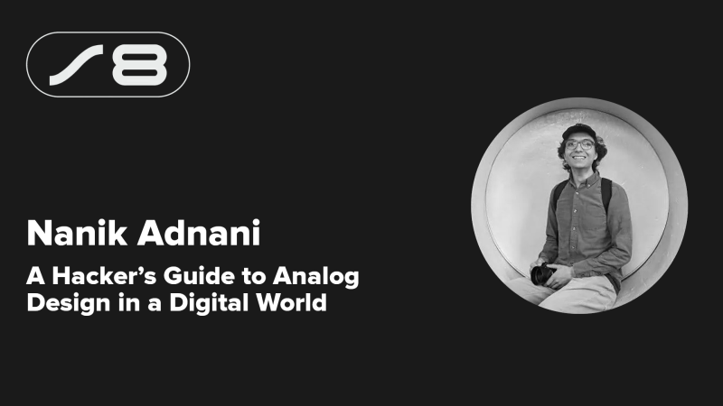 A black and white slide with the Supercon 8 logo in the top left, the text, "Nanik Adnani" and "A Hacker's Guide to Analog Design in a Digital World" is in the bottom left. To the right is a circularly cropped image of An image of a college student in glasses and a cap sitting with a black camera in his lap.