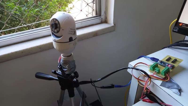 Camera is seen on the left with an Arduino connected to the right