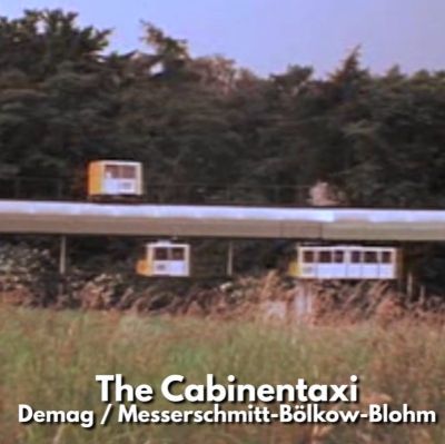 Image of the Cabinentaxi from a promotional video, showing carriages on top and below the monorail.