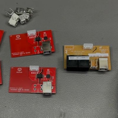 The old and new USB-serial boards side by side. (Credit: VoltLog, YouTube)