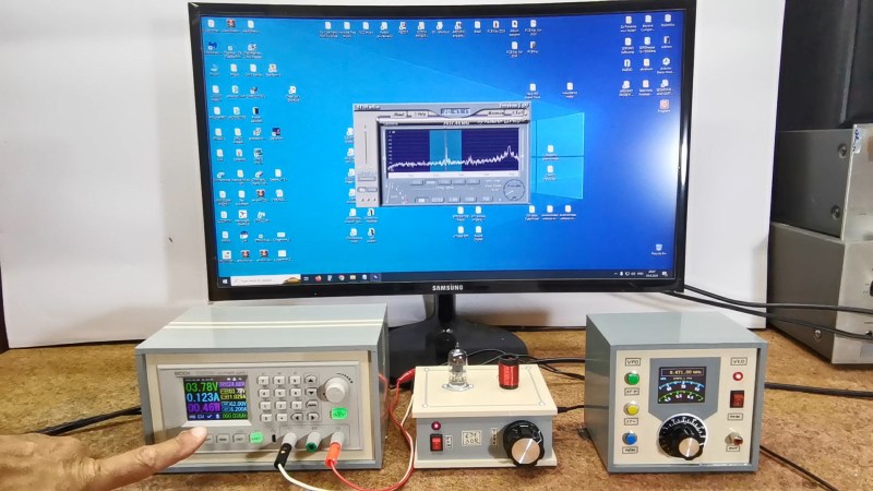 The one-tube radio setup, in front of a PC monitor