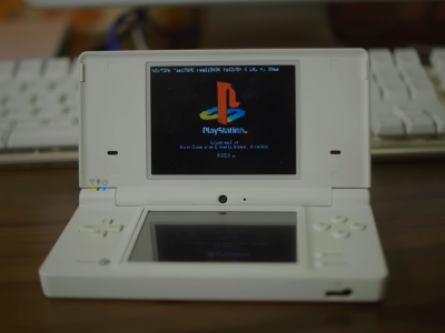 PS1 logo on the top screen of a white DS