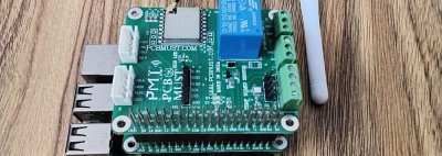 A photo of the HAT with the LoRa module and relay visible on the top