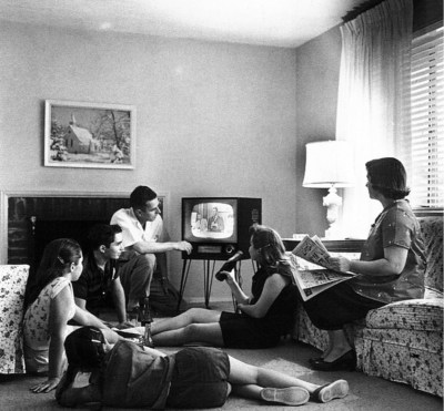 Family watching television in their home, c. 1958 (Credit: Evert F. Baumgardner)