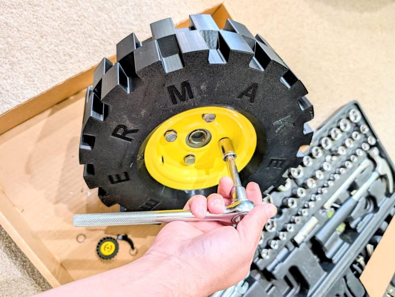 Blocky tread, yellow hub-- yep, it looks like LEGO
