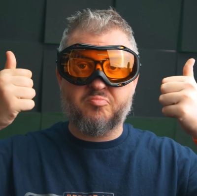 Ski goggle type laser safety lenses may look dorky, but they leave no gaps and fit around glasses. (Credit: FauxHammer, YouTube)
