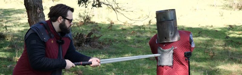 PLA mail being tested against a sword