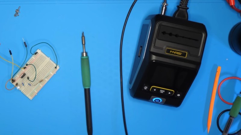 A photo of [nanofix]'s bench including his FNIRSI soldering station.