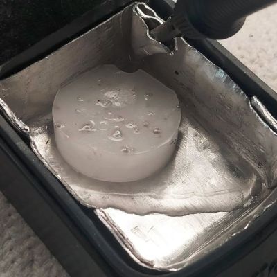 Resetting the paraffin trap. (Credit: MisterHW)