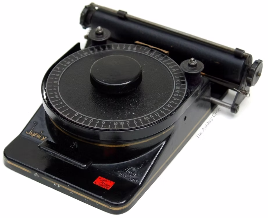 An interesting circular index typewriter in black.