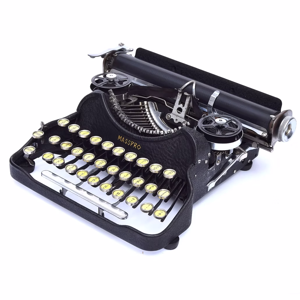 The Masspro, a lovely minimal typewriter with an interesting, hieroglyphic-like logo. 