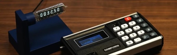 The clock and the rebuilt calculator from which its VFD was donated.