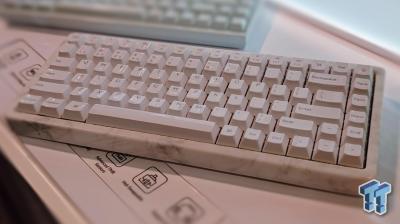 A marble TKL keyboard with ceramic keycaps. 