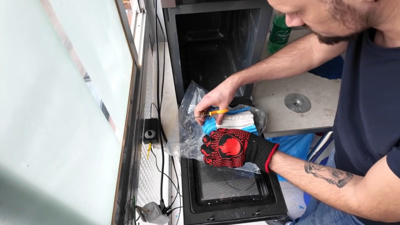 [Denny] removing a plaster bust from a microwave-softened mold