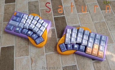 A brightly-colored split with a built-in num pad on the right half. 