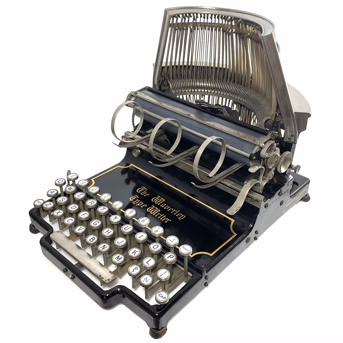 The elegant Waverley typewriter with it's lovely curling paper holder and tall-standing type bars.