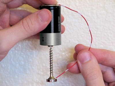 A very simple homopolar motor. Here the neodymium magnet and screw spin whenever the wire conducts current. (Credit: Windell H. Oskay, Wikimedia)
